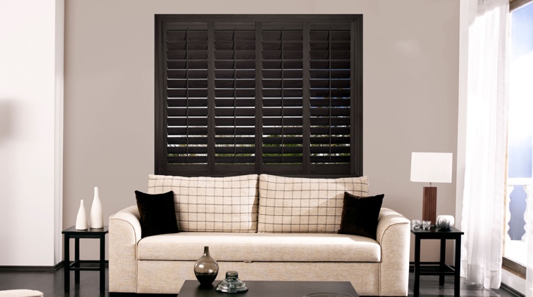 Phoenix living room with black shutters.
